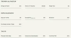 Picture of menu information at COMEDOR By La Taqueria